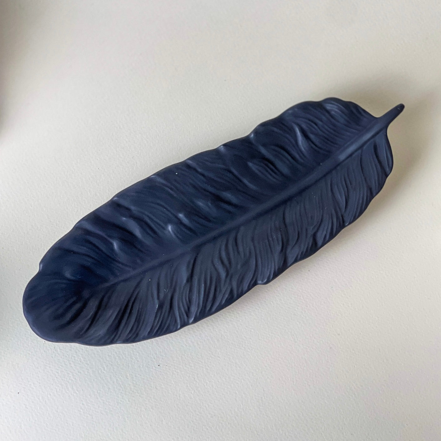 Feather dish